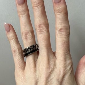 Coach black and silver ring set.